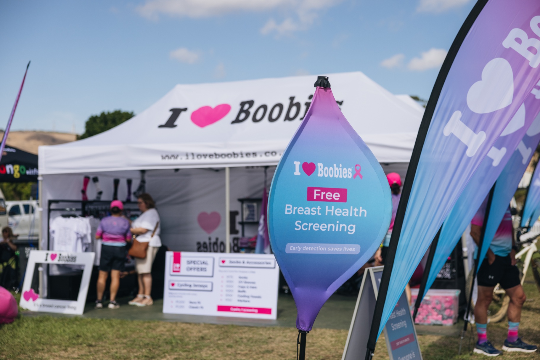Free breast health screening flag at an event